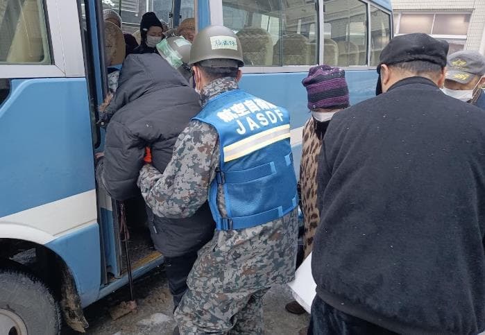 JSDF personnel assist with earthquake evacuation in Japan